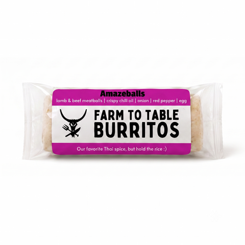 A packaged food product labeled 'Farm to Table Burritos' by Amazeballs, shown in a clear plastic wrap with a bright pink and white label on a plain white background.