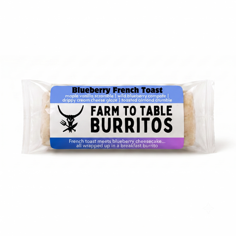 A packaged breakfast burrito labeled 'Blueberry French Toast' with a blue, white, and purple label reading 'FARM TO TABLE BURITOS' on a clean white background.