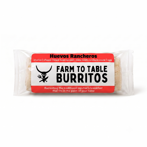 A packaged breakfast burrito labeled 'Farm to Table Burritos' with a red, white, and black label, photographed on a clean white background.