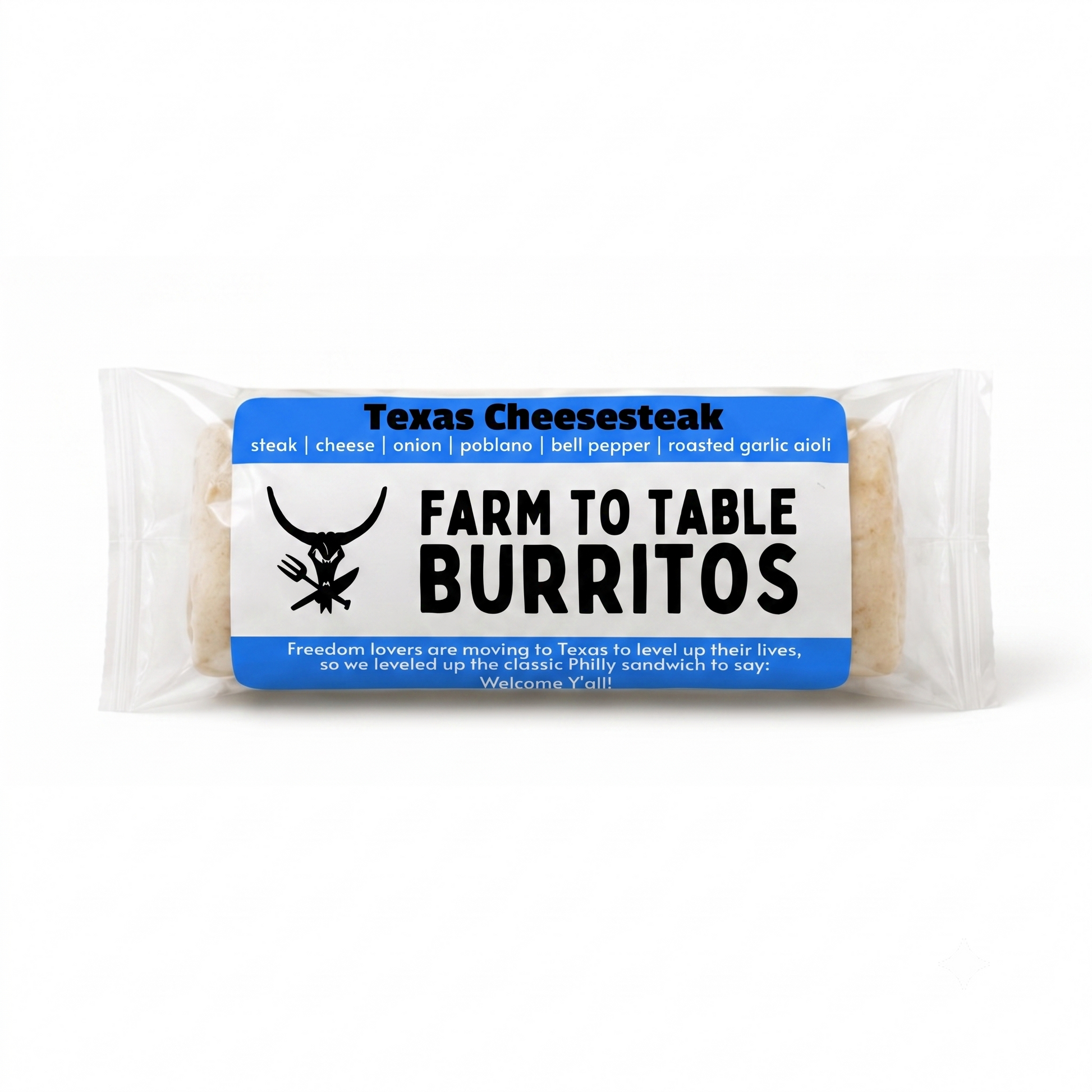 A packaged burrito on a clean white background. The clear plastic wrapper shows a round burrito with a blue and white paper label that reads 'Texas Cheesesteak' and 'FARM TO TABLE BURITOS' with a black steer logo.